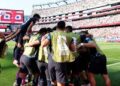 Paraguay players celebrating after eliminating Germany on penalties