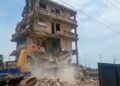Unsafe Buildings Must Go Down To Protect Lives — NADMO 3 NADMO demolishing a building in Osu.