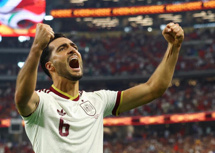 Super Sub Merino Strikes Late to Send Spain to WC Quarters 1 Mikel Merino celebrates after scoring the winner against Portugal
