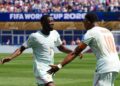 Ousmane Dembele and Kylian Mbappé celebrating after scoring against Morocco