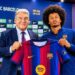 Barcelona president Joan Laporta (left) and Karim Adeyemi pose for a photo with the Barcelona home shirt
