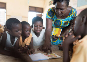 One in Three Districts in Ghana Faces Severe Teacher Shortages, Report 3 Basic School Children in Ghana receiving instructions from their teacher