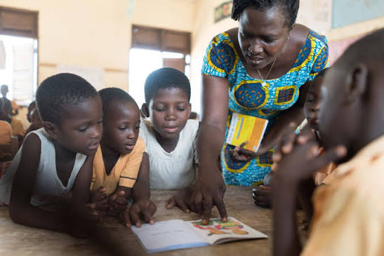 One in Three Districts in Ghana Faces Severe Teacher Shortages, Report 1 Basic School Children in Ghana receiving instructions from their teacher