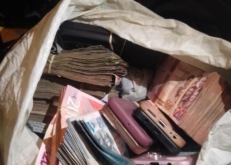 Police Recover GH¢140,000 and AK-47 Rifle After Deadly Robbery Attempt at Lashibi 1 Cash Bag of GH¢140,000.00