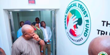 President Mahama unveils the plaque marking the official commissioning of the new Cardiac Catheterisation Laboratory at Korle-Bu Teaching Hospital, alongside officials from the Ghana Medical Trust Fund and the Ministry of Health.