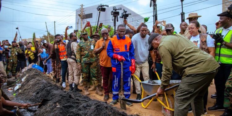 Beyond the Two-Day National Clean-Up, Accra Needs Bold Action 1 President John Dramani Mahama participates in the National Clean Up Exercise and inspects drain desilting works at Alajo to strengthen flood prevention efforts