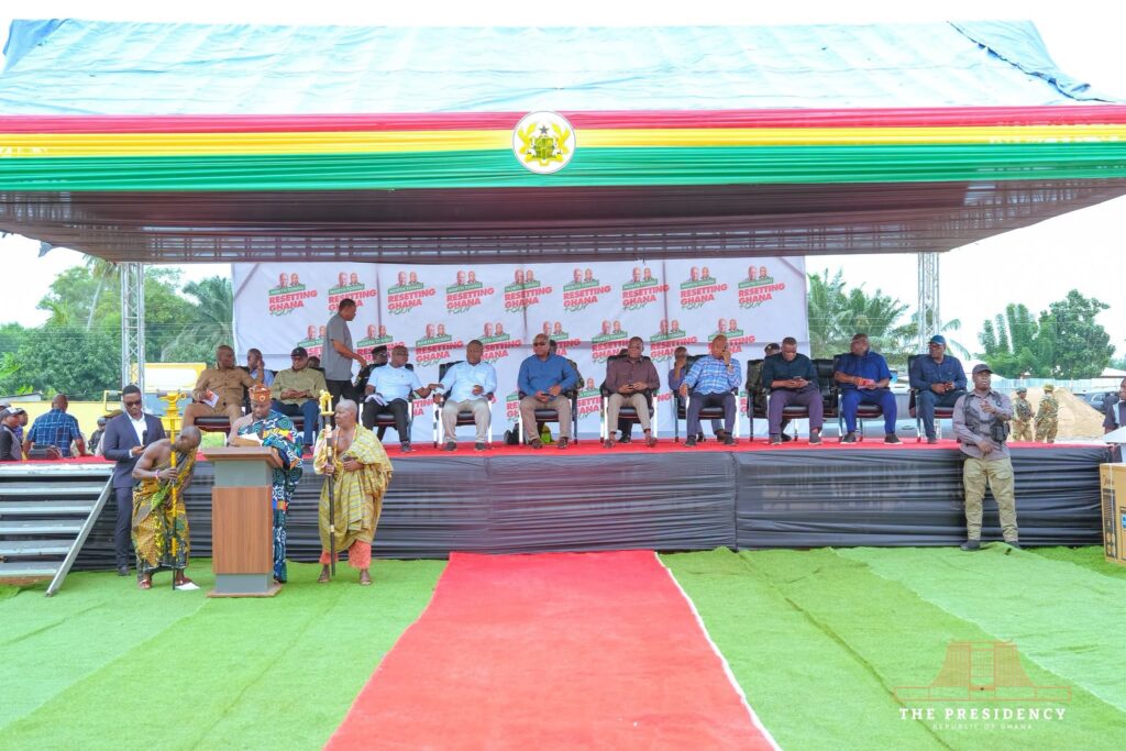 Mahama Vows Fair Share of Development for Volta Region 4 President Mahama seated at the high table during the Juapong market ceremony, joined by government officials and traditional authorities of the North Tongu District.