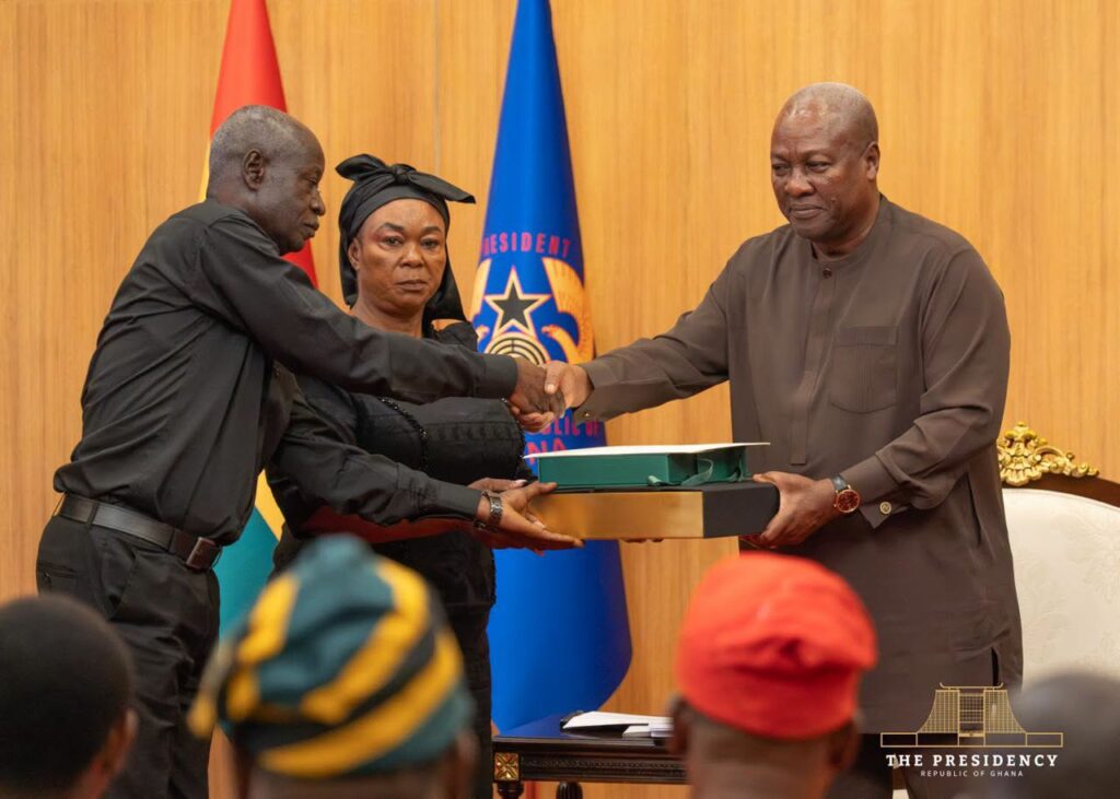 President John Dramani Mahama presents the government’s compensation package to one of the eight bereaved families of the August 6, 2025 helicopter crash victims at the Jubilee House