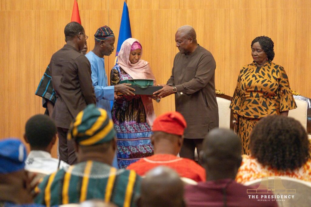 President John Dramani Mahama presents the government’s compensation package to one of the eight bereaved families of the August 6, 2025 helicopter crash victims at the Jubilee House