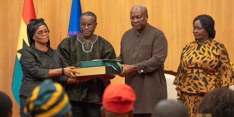 President John Dramani Mahama presents the government’s compensation package to one of the eight bereaved families of the August 6, 2025 helicopter crash victims at the Jubilee House