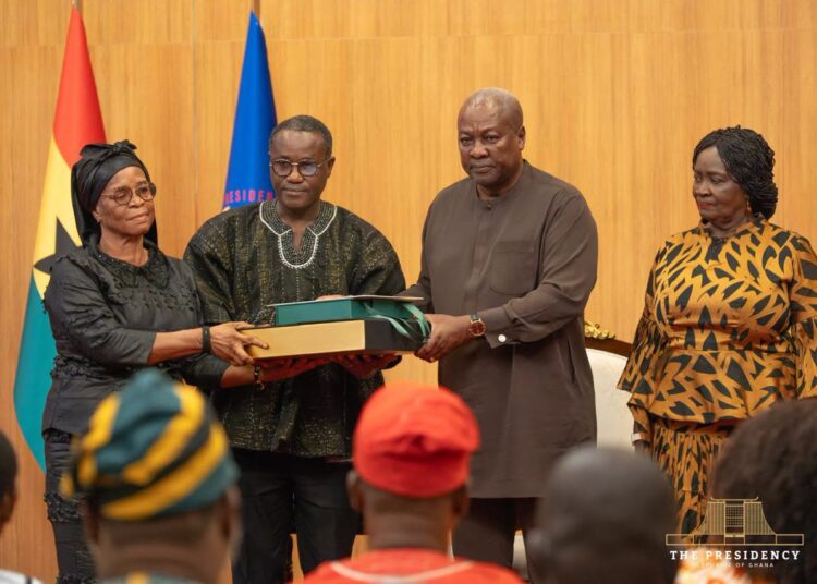President John Dramani Mahama presents the government’s compensation package to one of the eight bereaved families of the August 6, 2025 helicopter crash victims at the Jubilee House