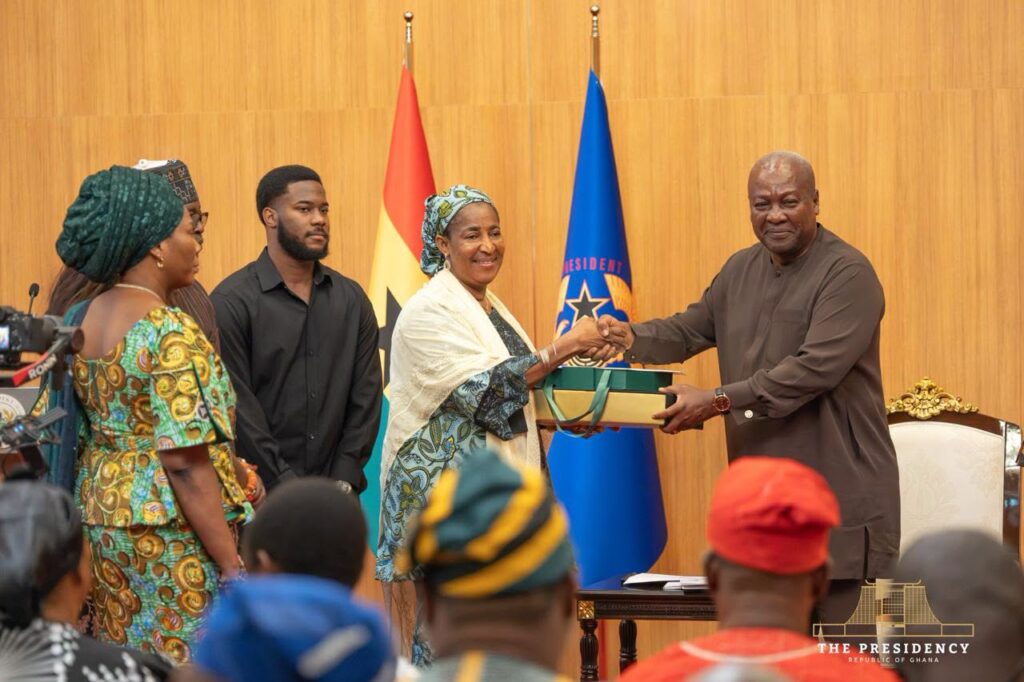 President John Dramani Mahama presents the government’s compensation package to one of the eight bereaved families of the August 6, 2025 helicopter crash victims at the Jubilee House