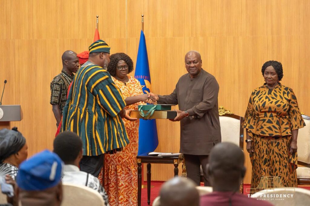 President John Dramani Mahama presents the government’s compensation package to one of the eight bereaved families of the August 6, 2025 helicopter crash victims at the Jubilee House