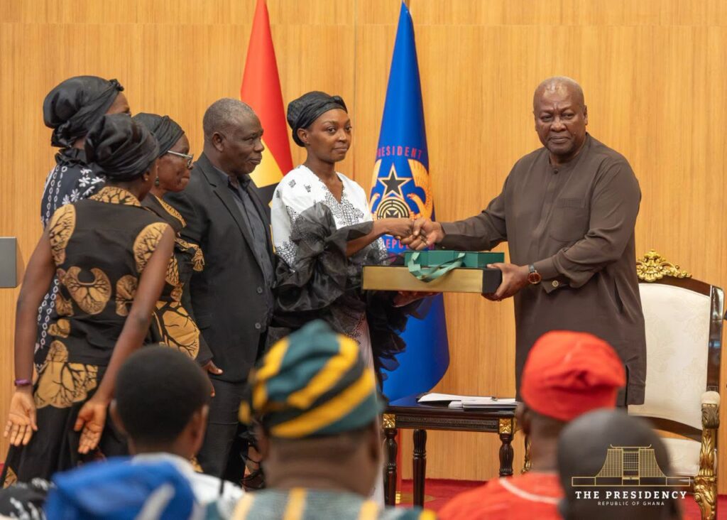 President John Dramani Mahama presents the government’s compensation package to one of the eight bereaved families of the August 6, 2025 helicopter crash victims at the Jubilee House