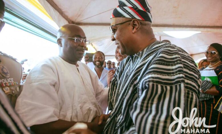 President John Dramani Mahama and former Vice President Dr Mahamudu Bawumia shaking hands at a public event
