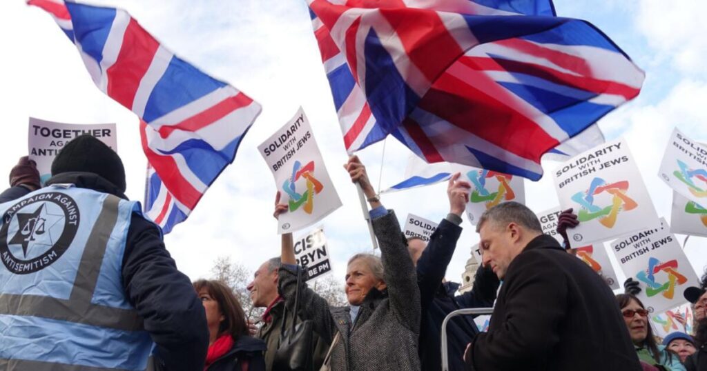 UK Antisemitic Incidents Reach Record High, Report Finds 2 Protestors at an antisemitic protest