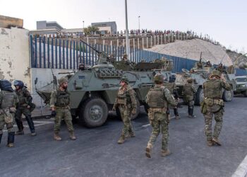 Spanish military stands at the border between the Spanish enclave of Ceuta and Morocco,