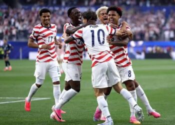 USA, Bosnia Refuse to Abandon Identity Ahead of RO 32 Showdown 4 USMNT players celebrating after scoring against Paraguay in their opening game of the 2026 FIFA World Cup