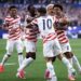 USMNT players celebrating after scoring against Paraguay in their opening game of the 2026 FIFA World Cup