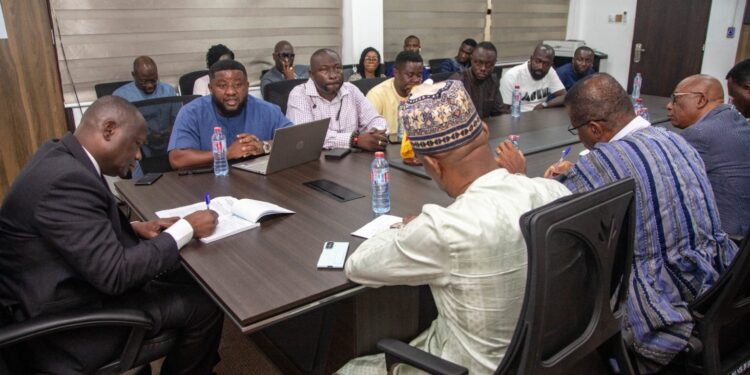 Lands Minister Reassures Government’s Support for Responsible Small-Scale Mining 1 Honourable Emmanuel Armah-Kofi Buah with members of the National Concerned Small Scale Miners Association