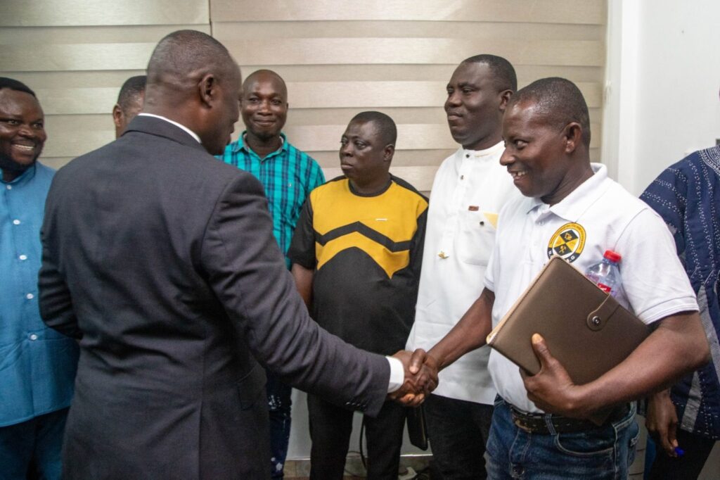 Lands Minister Reassures Government’s Support for Responsible Small-Scale Mining 2 Honourable Emmanuel Armah-Kofi Buah with members of the National Concerned Small Scale Miners Association