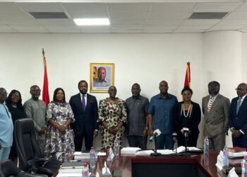 Members of the newly inaugurated Constitution Review Implementation Committee pose at the Ministry of Justice, chaired by Marietta Brew Appiah-Oppong, following their swearing-in.