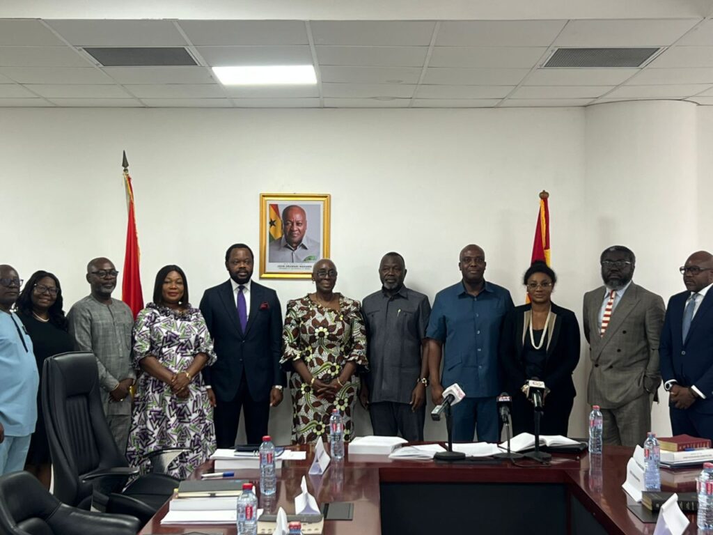 Members of the newly inaugurated Constitution Review Implementation Committee pose at the Ministry of Justice, chaired by Marietta Brew Appiah-Oppong, following their swearing-in.
