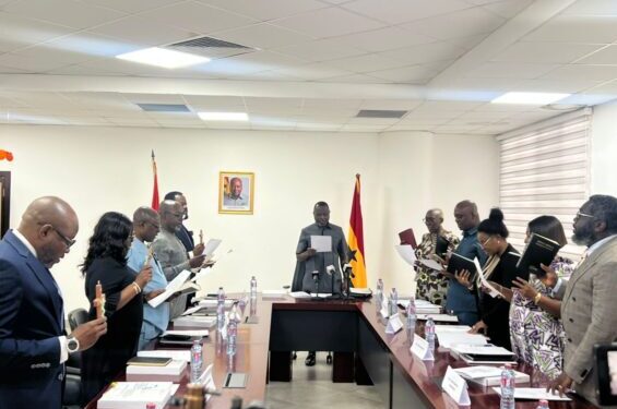 Committee members are sworn in at the Ministry of Justice as Attorney-General Dr Dominic Akuritinga Ayine oversees the inauguration of the 11-member body
