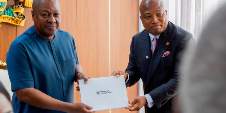 Ablakwa hands the Ministry of Foreign Affairs report envelope to President Mahama, formally closing out the committee's mandate ahead of Ghana's 2027 AU chairmanship.