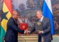 Foreign Affairs Minister Samuel Okudzeto Ablakwa, left, and Russian Foreign Minister Sergey Lavrov exchange the signed copies of the visa waiver agreement covering diplomatic and service passports. Photo: Ministry of Foreign Affairs
