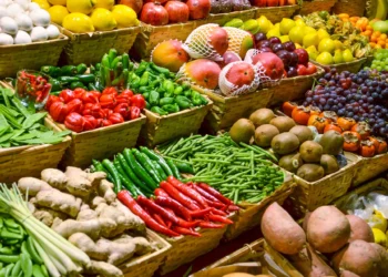 Most Countries Unlikely to Meet 2030 Food System Goals, FAO Warns 1 A vibrant display of fresh produce at an open-air market stall