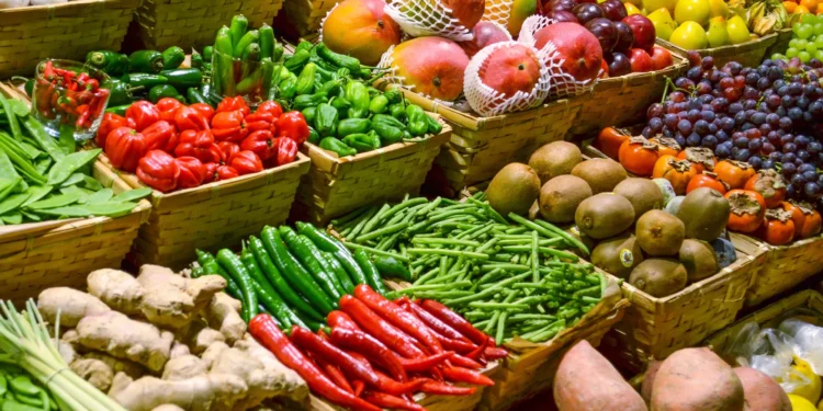 Most Countries Unlikely to Meet 2030 Food System Goals, FAO Warns 1 A vibrant display of fresh produce at an open-air market stall