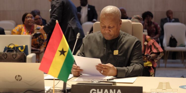 Move From Words to Action on Peace Financing, Mahama Tells AU Leaders 1 President John Dramani Mahama reviews his notes at Ghana's seat during the 21st Extraordinary Session of the African Union Assembly in Luanda on Sunday. Photo: The Presidency