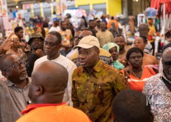 Mahama Ayariga Pledges Push to Complete Kejetia Phase II after Inspection 2 Ayariga speaks with traders inside the market during his visit, part of his engagement with stakeholders affected by the project's delays.