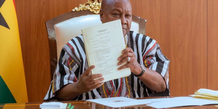 Ten New Laws: Mahama Assents to Customs, Tribunals and Cocobod Bills 1 President John Dramani Mahama holds up the Customs Act, 2026, the most voluminous of the ten laws he assented to, at the Presidency in Accra. Photo: The Presidency
