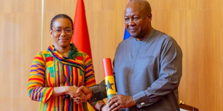 President John Dramani Mahama presents the instrument of appointment to Dr Zanetor Agyeman-Rawlings, Minister for Environment, Science and Technology, at Jubilee House on Saturday. Photo: The Presidency
