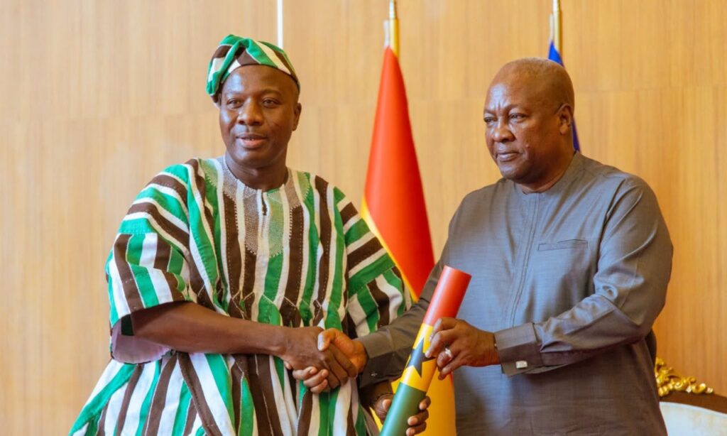 President Mahama presents the instrument of appointment to Mahama Ayariga, Minister for Local Government, Chieftaincy and Religious Affairs, after administering the three oaths of office. Photo: The Presidency