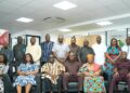 GIPA officials and members of the Parliamentary Select Committee on Trade, Industry and Tourism pose for a group photograph after the working visit.