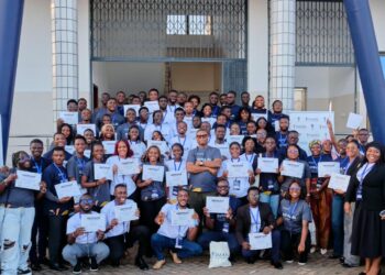 Participants pose with Franklin Cudjoe and their certificates at the close of SYPALA 2026, the 20th edition of the programme, held at the University of Professional Studies, Accra.