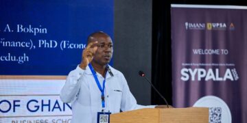 Professor Godfred A. Bokpin of the University of Ghana Business School addresses participants at SYPALA 2026, held under the theme "Resilient Economies."