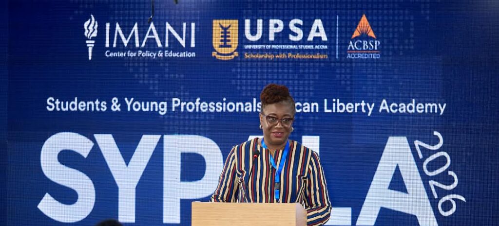 "Carry Your Own Folding Chair," Bridget Dzogbenuku Tells Women at SYPALA 2026 3 Bridget Dzogbenuku takes the podium at SYPALA 2026, hosted by IMANI, UPSA and ACBSP under the "Resilient Economies" theme.