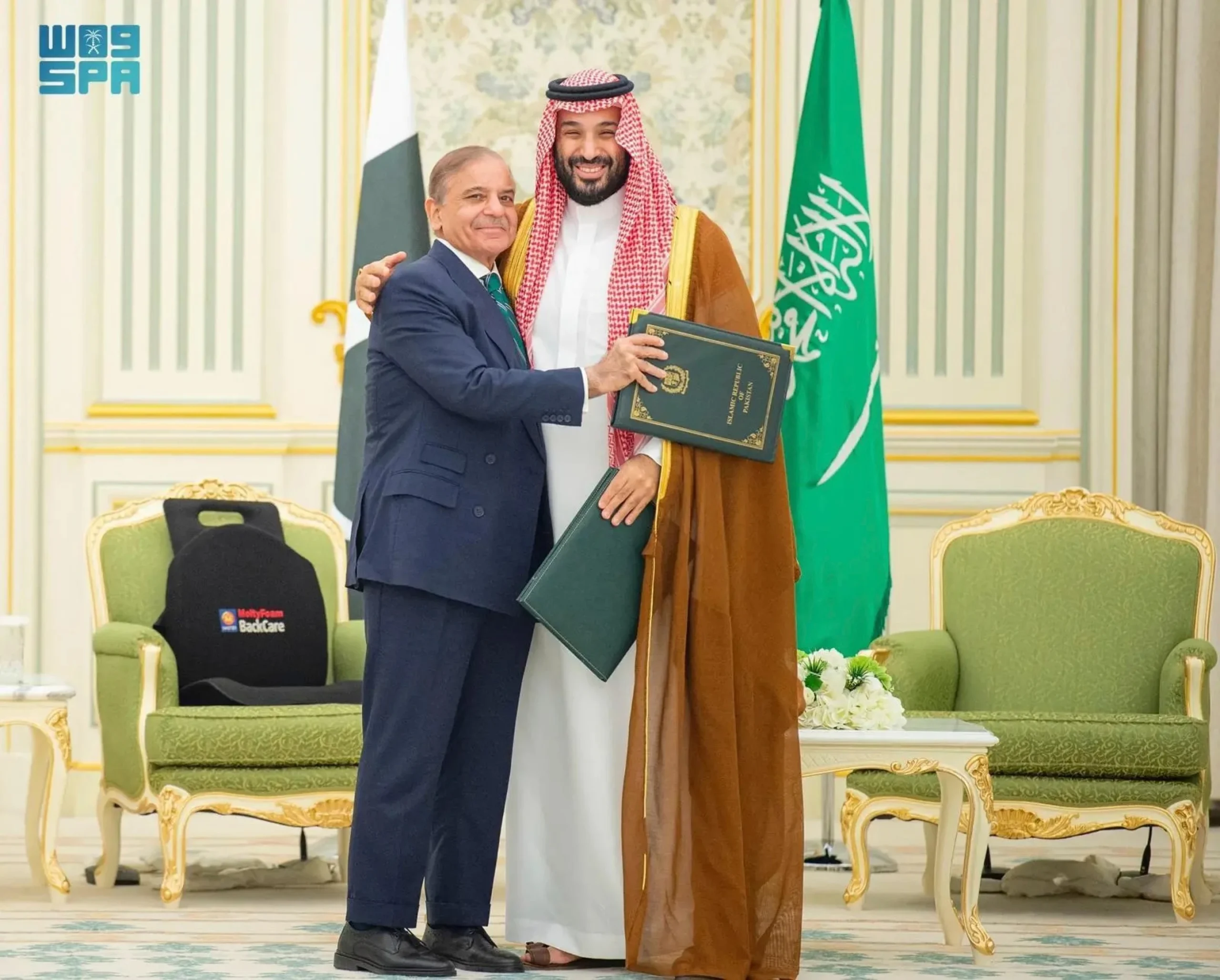 Pakistan’s Prime Minister Shehbaz Sharif embraces Saudi Crown Prince Mohammed bin Salman after signing the defense agreement.