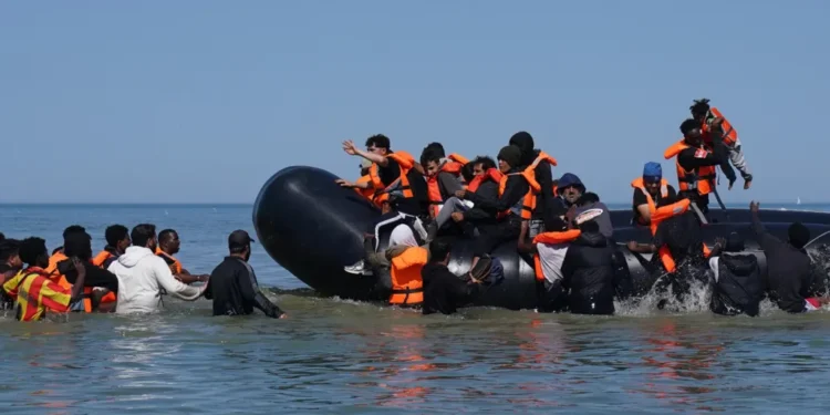 France Rejects Reform UK's Proposal to Deploy Royal Navy in English Channel 1 Migrants attempting to cross the English Channel from France to UK