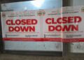 EPA Shuts Down Empire Cement Ghana Limited over Air Pollution Breaches 7 "Closed Down" notices from the Environmental Protection Authority (EPA), dated September 16, 2026, sealed on a glass entrance at Empire Cement Ghana Limited. The notices cite the Environmental Protection Act, 2025 (Act 1124) and warn that tampering with them attracts a fine.