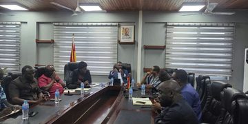 Officials from IMANI and the Ministry of Youth Development and Empowerment engage in discussion during the strategic dialogue held at the Ministry's Accra premises