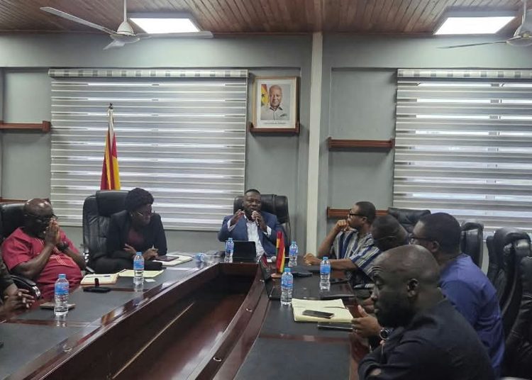 Officials from IMANI and the Ministry of Youth Development and Empowerment engage in discussion during the strategic dialogue held at the Ministry's Accra premises