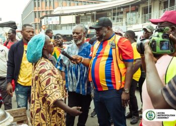 Mayor of Accra, Hon. Michael Kpakpo Allotey, Engaging Traders at Makola Market During the National Sanitaion Exercise