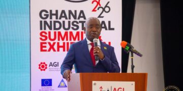 Hon. Sampson Ahi, Deputy Minister for Trade, Agribusiness and Industry Addressing Stakeholders at the Summit