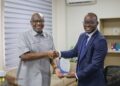 Standard Chartered Bank Pledges Partnership on New Crop Financing Model to COCOBOD 6 Dr. Ransford Abbey, CEO of COCOBOD, in a Handshake with Mr. Korse Godzi, CEO of Standard Chartered Bank , After a Working Visit to the Cocoa House to Strengthen Partnership on Cocoa Financing
