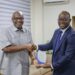 Dr. Ransford Abbey, CEO of COCOBOD, in a Handshake with Mr. Korse Godzi, CEO of Standard Chartered Bank , After a Working Visit to the Cocoa House to Strengthen Partnership on Cocoa Financing